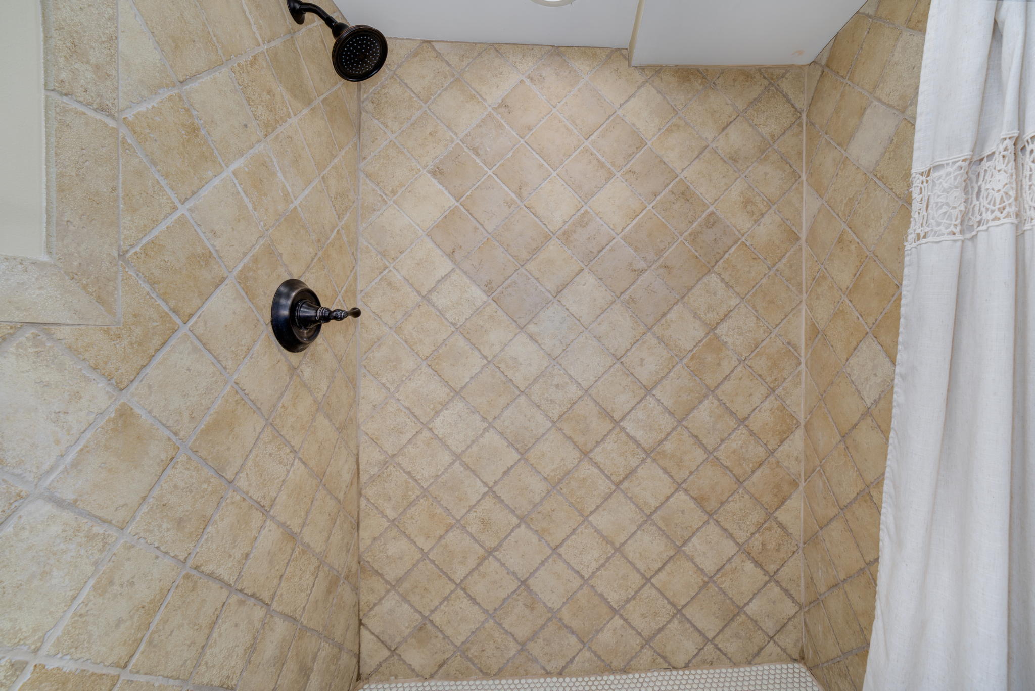 The main floor shower. Beautiful tile work!