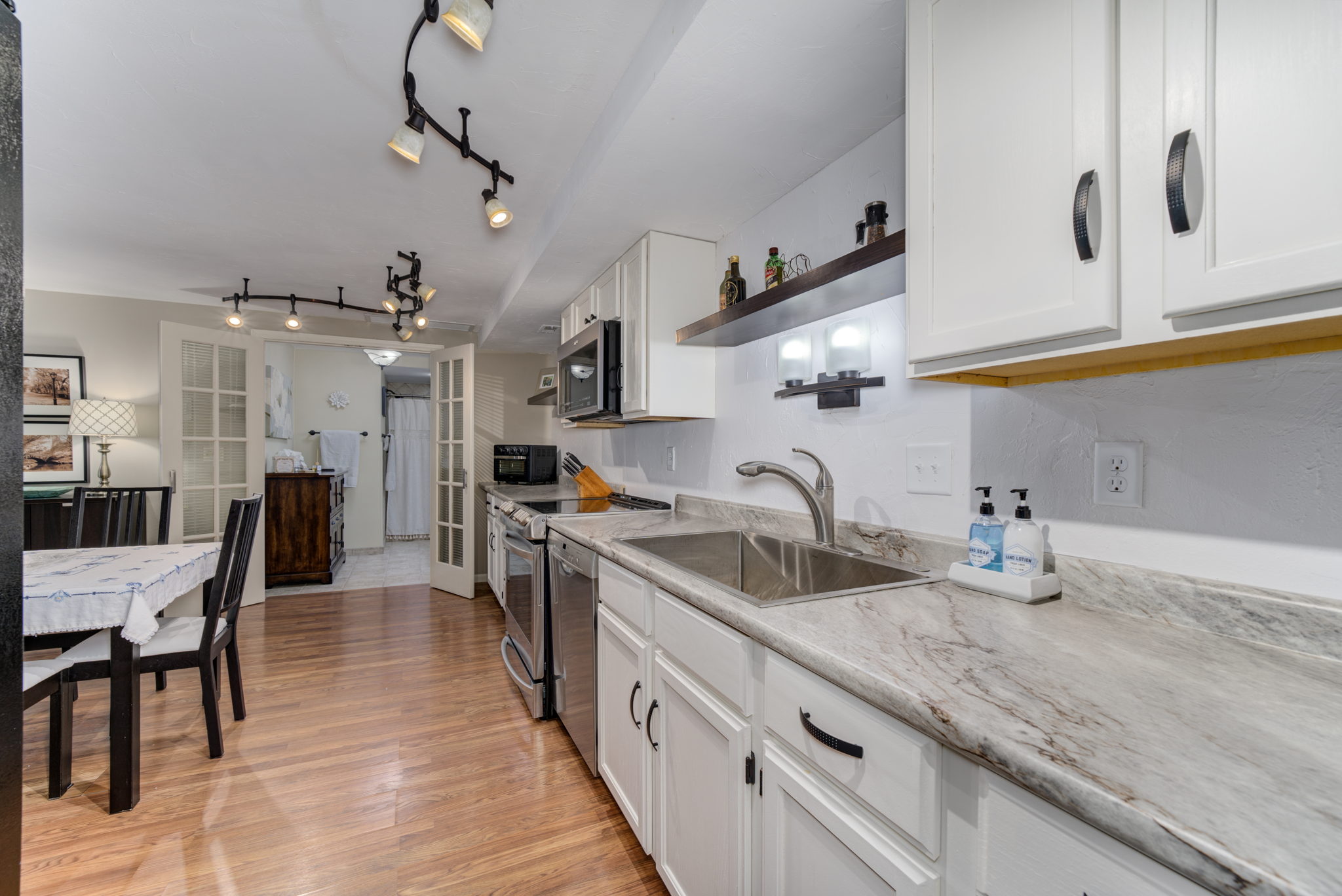 Kitchen with a view from the garage .