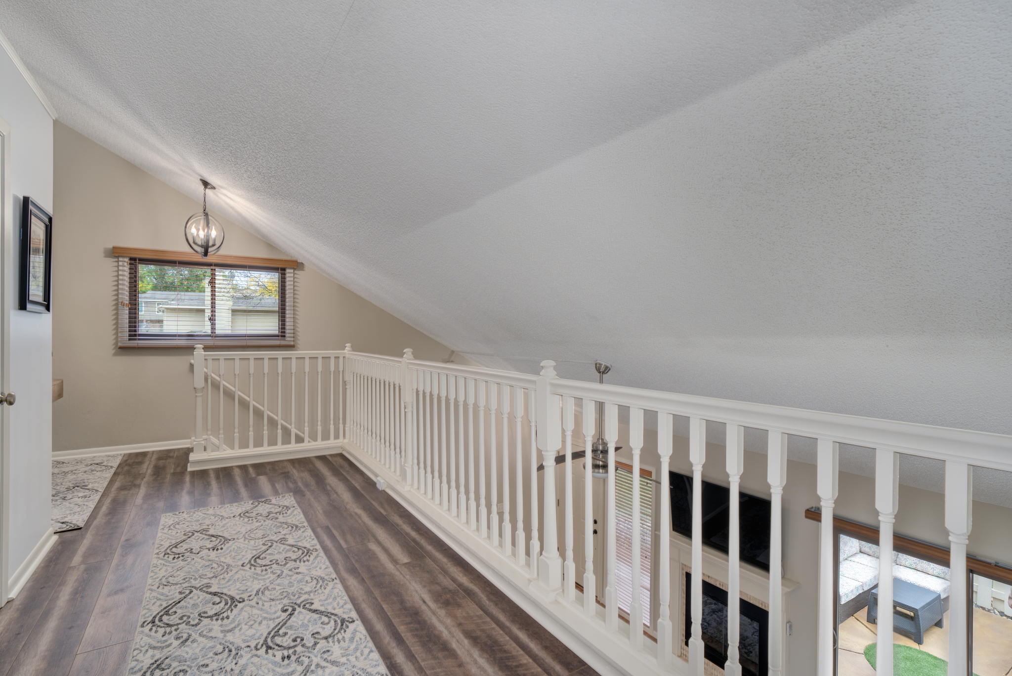The upper level is bright and open.