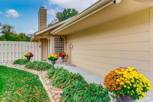 Pride of ownership shows at every vantage point. Isn't this a lovely walkway to the front door!