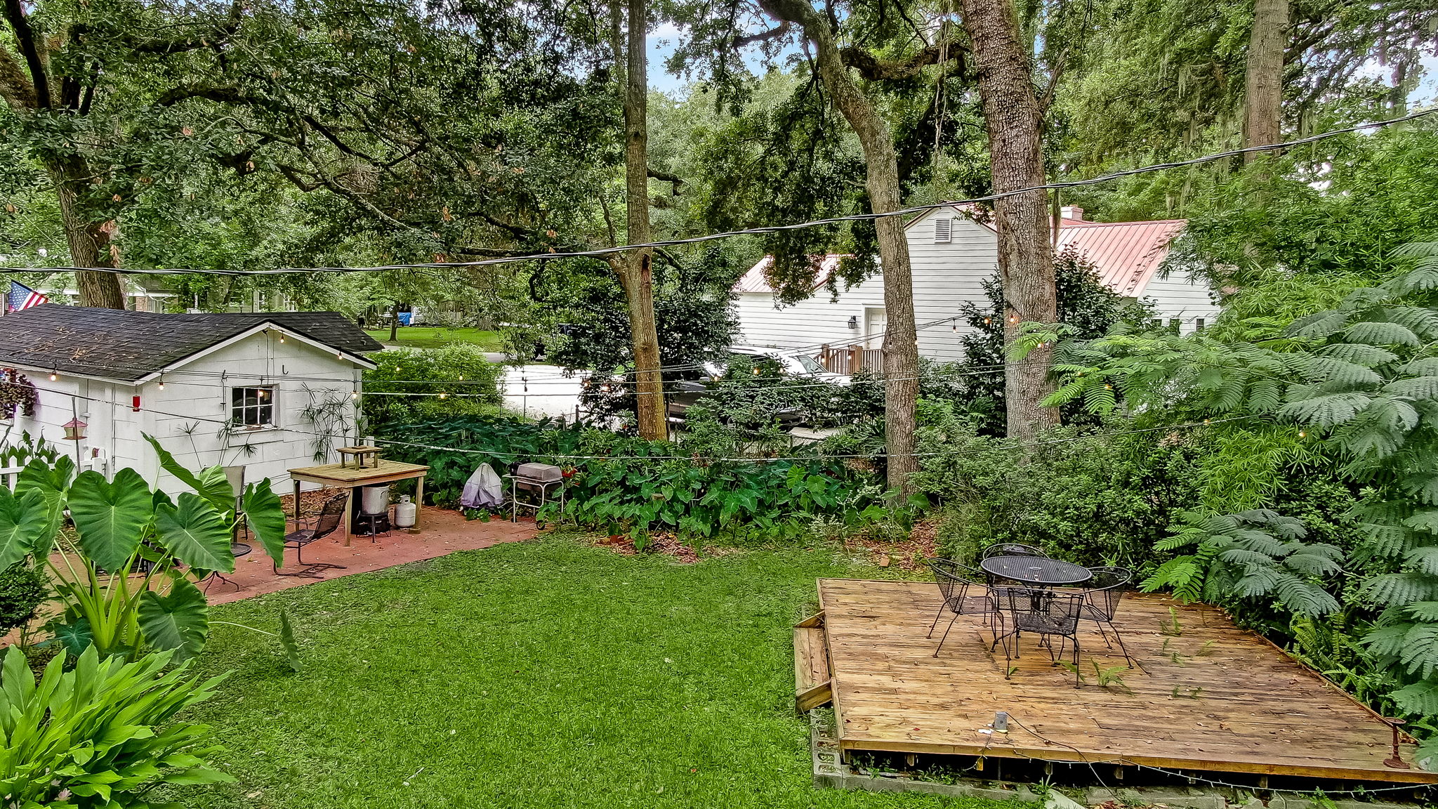 Back Yard flex deck plumbed with power, water and gas