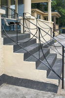 Wrought-iron railing on front porch