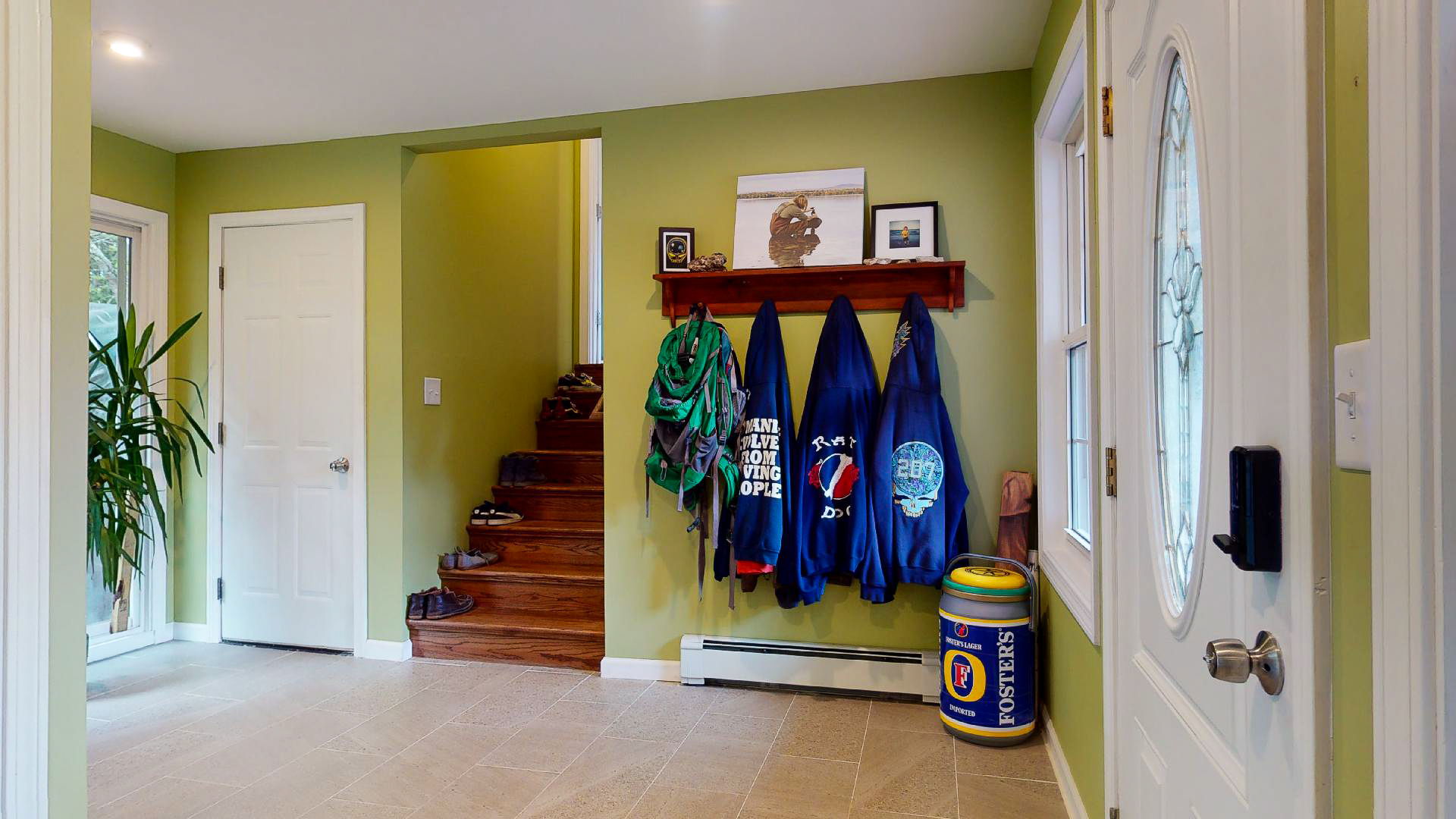 Entry with steps up to Primary Suite